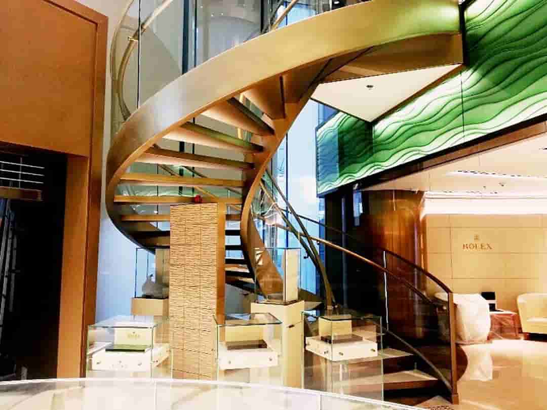 Staircase Store Gold plated Steel Spiral Staircase, Rolex Store, HKIA | Goldwave